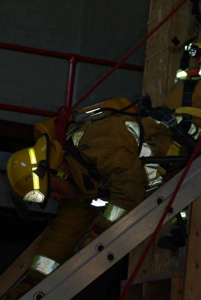 Keegan Muldowney exits 2nd story window head first.  Ladder bail technique during New York State Firefighter Survival course in Willsboro NY 9/25/2010